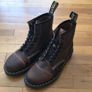 Size 7 men’s dark brown Doc Martens.